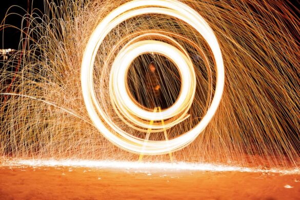 Participants dancing in traditional clothing during festival celebrations.