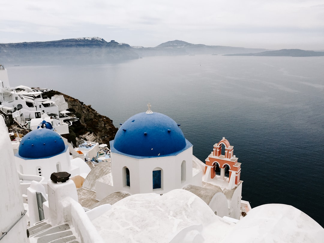 Santorini iconic views with blue domes