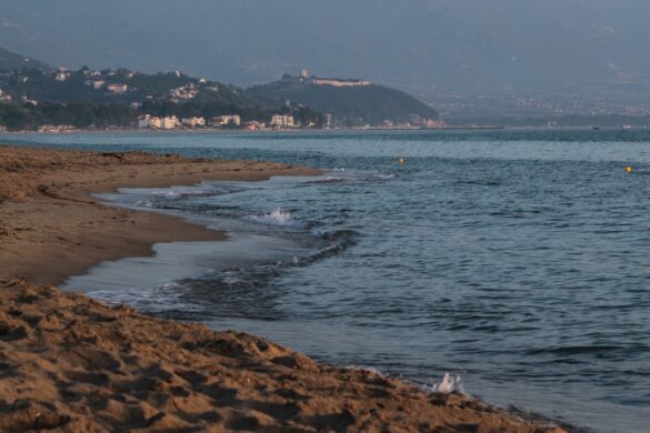 Golden Bay with clear blue waters and sandy beaches.
