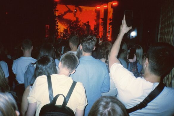 Crowd enjoying performances at Glastonbury Festival.