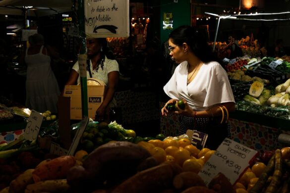 A bustling market full of fresh produce and street food