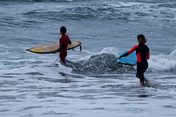 Surfing at Tamarindo Beach