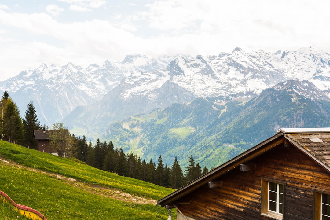 Scenic mountains of Switzerland with blue sky.