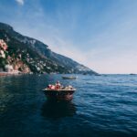 Travelers enjoying the beautiful Italian coastline