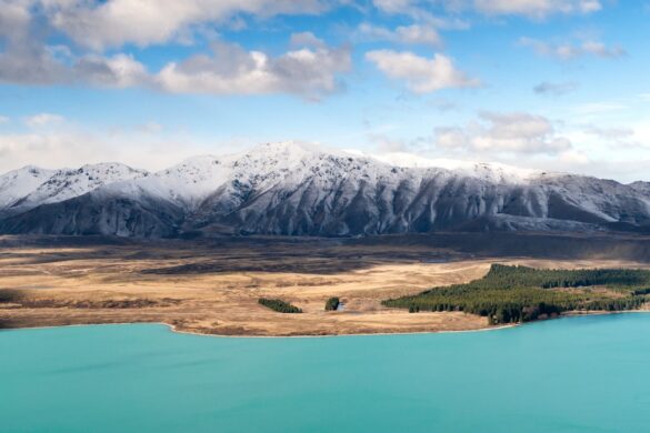 Surfing at Raglan Beach