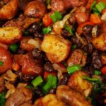 Various Portuguese dishes including Francesinha