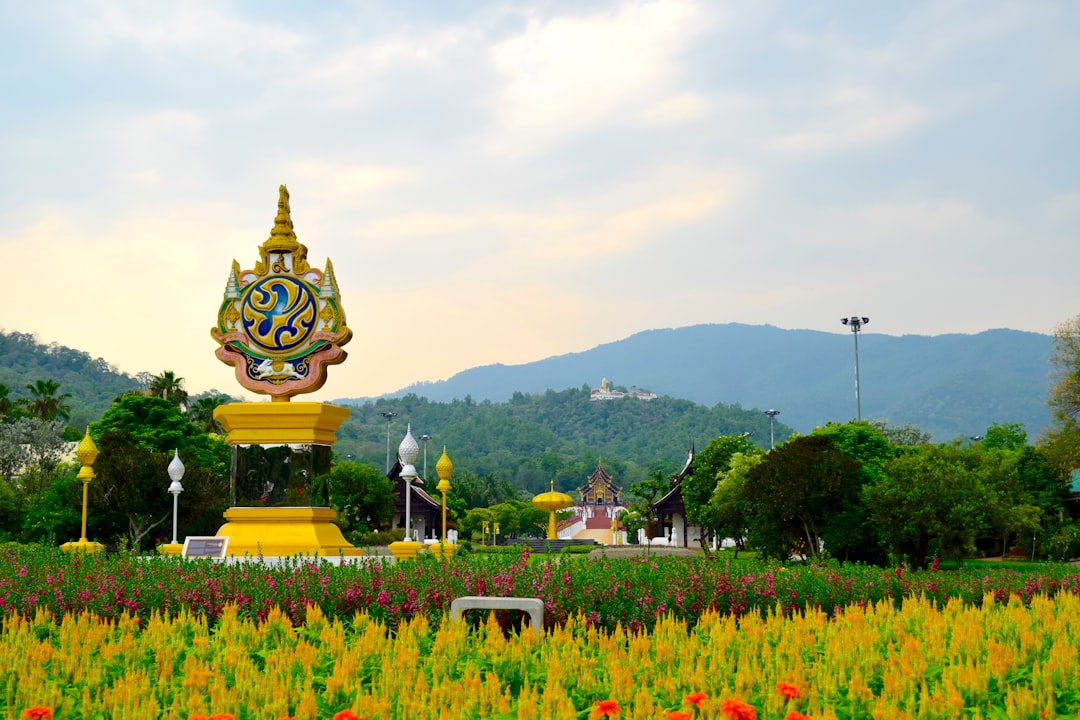 photo-1708885820165-61ebe4f6c51b.jpg Wat Phra That Doi Suthep at sunset during Loy Krathong festival.