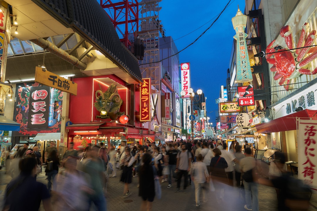 photo-1759475382440-a598bd17b65c.jpg Street food market in Osaka