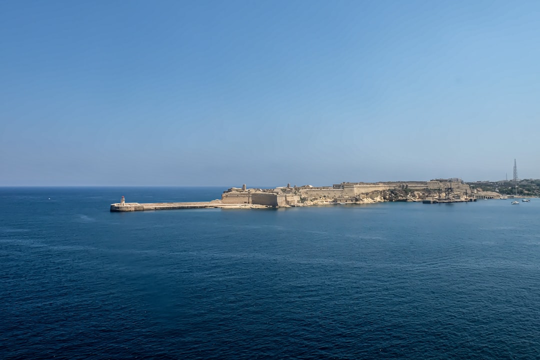 photo-1770327100455-10e8a633cf24.jpg Sunset view of Malta coastline